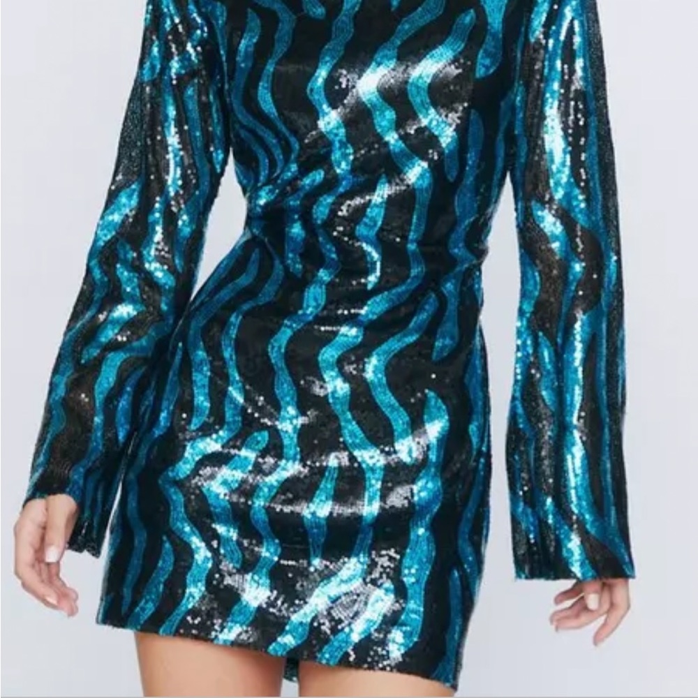 Long sleeved sequined mini dress